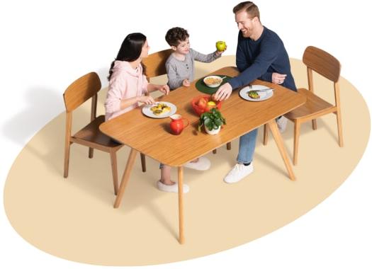 Family of three enjoys a meal at the dining room table.